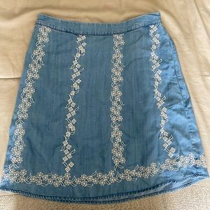 Never worn, blue skirt with white floral design!